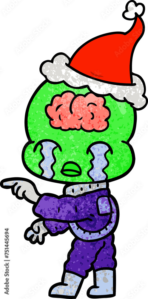 Fototapeta premium textured cartoon of a big brain alien crying and pointing wearing santa hat