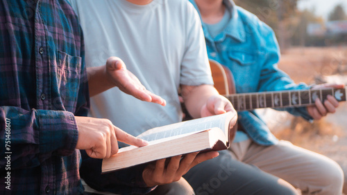 Christian group singing worship songs Read the Bible and share Bible verses. photo