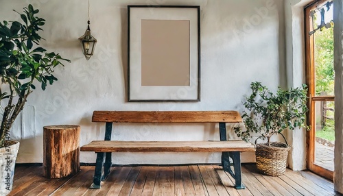 wooden bench against white wall with poster frame ethnic farmhouse interior design of modern entrance hall