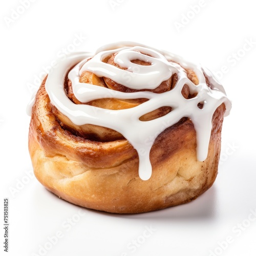 Cinnamon roll with white icing on white background