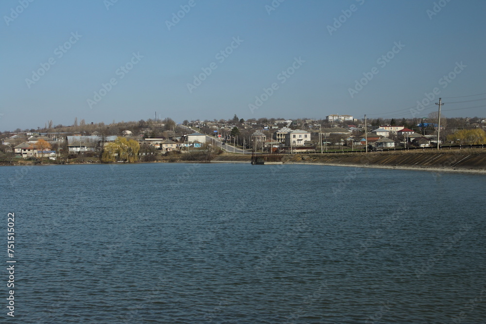 A body of water with houses along it