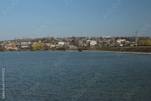 A body of water with houses along it