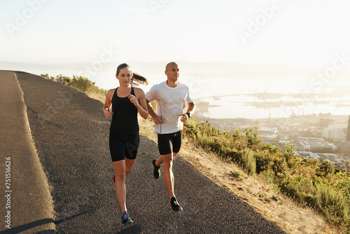 Road, running and woman with man for fitness, workout coach and race for healthy body. Exercise, wellness and girl runner with personal trainer, marathon and sports for outdoor training in morning. © Katie/peopleimages.com