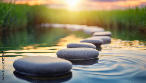 Tranquil sunset over Zen path with smooth stones above water, symbolizing peace and the promise of a bright future
