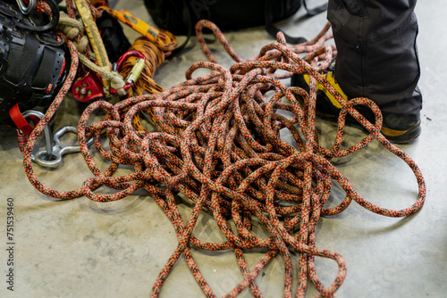 Climbing alpinist ropes in bright colors