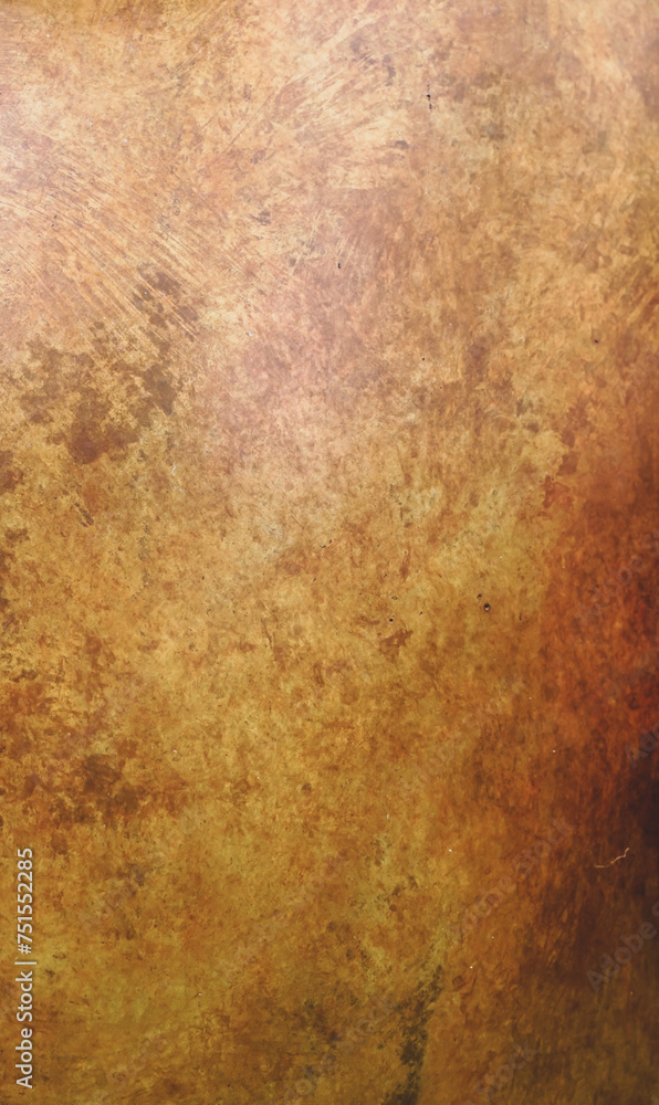 Empty gold or brass wall paint for abstract  background and foil texture. beautiful patterns, space for work, banner, wallpaper close up.Vertical.