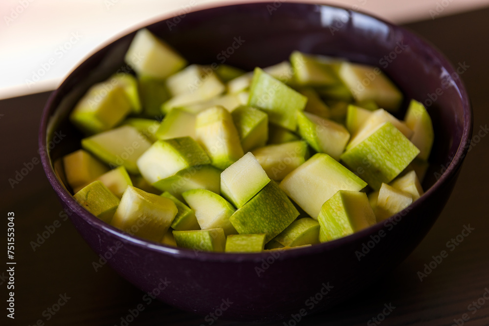 chopped zucchini in bowl close-up chopped zucchini in bowl close-up