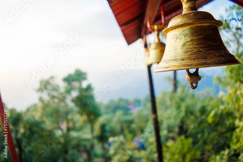 Bronze bells in Indian temple. Hindu temple bell. Brass made bell for Worshiping God. hanging bells. Lansdowne Hills. photo