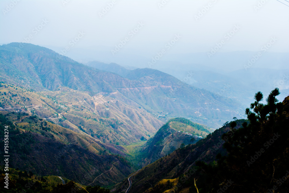 Beautiful  curvy Road on the mountains of Lansdowne, Uttarakhand. Aerial view of amazing curved road through the mountains.