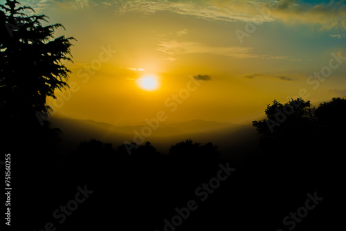 Sunset view from the mountains of Lansdowne. Mountain Sunset view in Lansdowne. Amazing  golden sunset seen through forest drive  Lansdowne Uttarakhand.