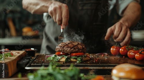 Close-up of a Chef hand Cooking Burgers on Grill in Kitchen, with steam rising in a professional kitchen setting.