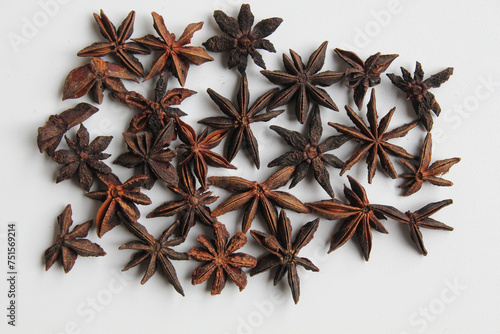 Dried star anise or Illicium verum, on white background, flat lay
