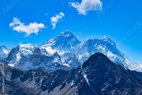 Stunning photo of highest peak on earth   8848 meter high Mount Everest along with Lhotse and Nuptse against the bright blue sky in this view from Gokyo Ri in Nepal