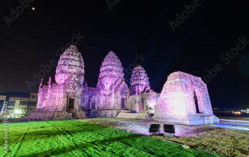 Phra Prang Sam Yot decorated with lights at night. It is a famous historical tourist attraction in Lop buri