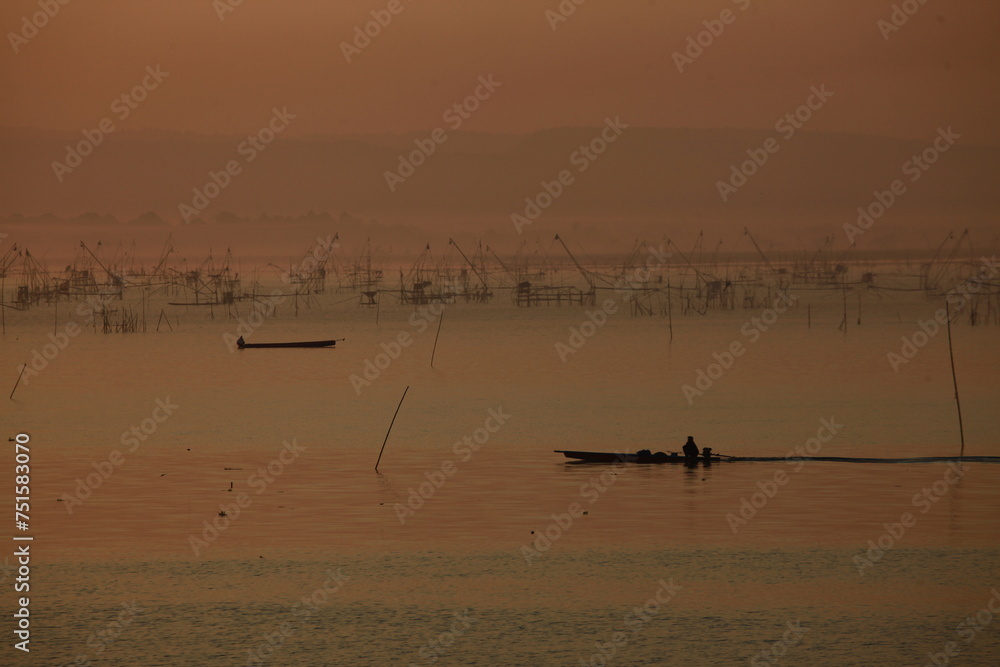 Fototapeta premium Huai Luang reservoir is a large reservoir for agriculture ,fisheries and water supply. It is a tourist attraction with beautiful landscape and local lifestyle.. UdonThani province,Thailand