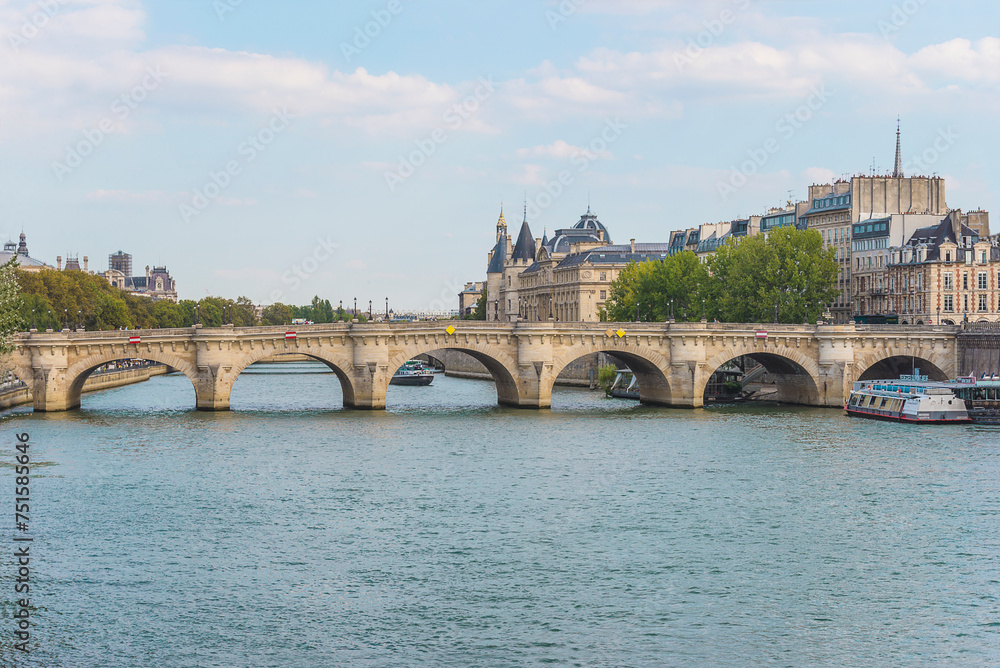 Paris, France; 08.22.2018: Parisian bridge Pont Neuf on the Seine river on summer day
