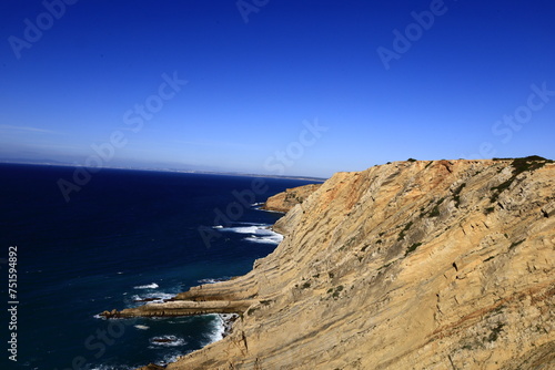 Cape Espichel is a cape situated on the western coast of the civil parish of Castelo  municipality of Sesimbra  in the Portuguese district of Set  bal
