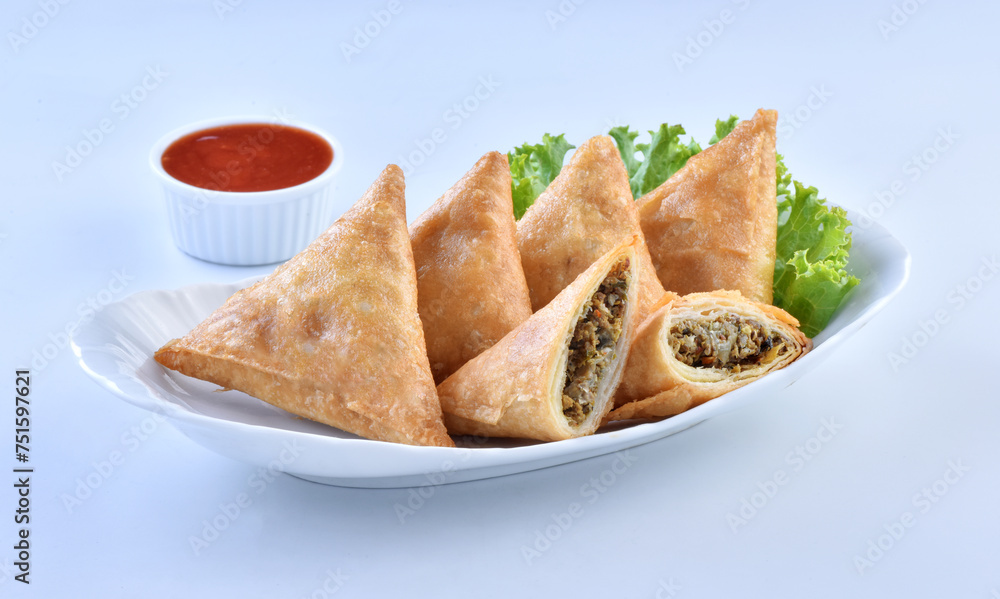 Samosa, a famous snack filled with spicy chicken and vegetables
