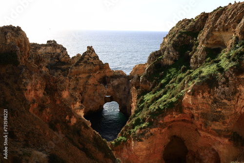 Foto Ponta da Piedade is a headland with a group of rock formations along the coastli