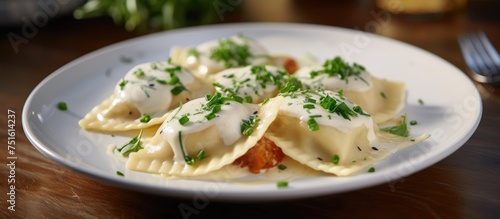 A plate of homemade ravioli topped with fresh parsley, inviting and delicious for a satisfying meal.