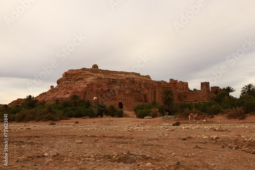 A  t Benhaddou is a historic ksar  fortified village  along the former caravan route between the Sahara and Marrakesh in Morocco