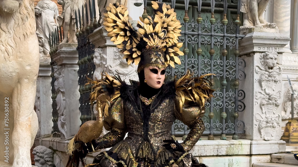 Fototapeta premium Venice Carnival. People in Venetian carnival masks and costumes on streets of Venice, Italy, Europe February 10, 2024