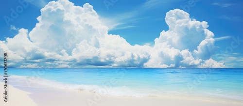 The painting depicts a pristine white beach with waves gently lapping at the shore. A white cloud dances in the blue sky above, adding a dynamic element to the serene scene.