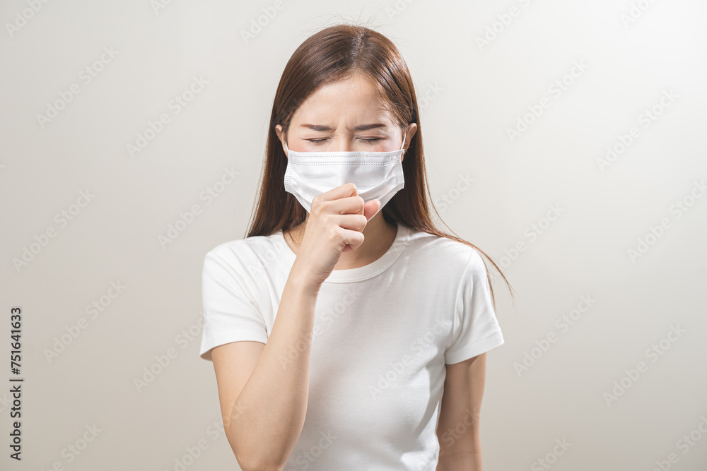 Unhealthy sickness, unwell asian young woman wearing mask coughing, have sore throat, suffering