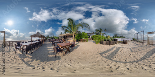 Fototapeta Naklejka Na Ścianę i Meble -  360 hdri panorama with coconut trees on ocean coast near tropical shack or open cafe on beach with swing in equirectangular spherical seamless projection