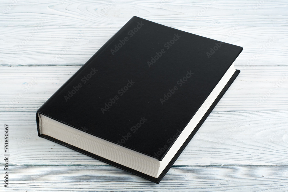 book on a white wooden table. Back to school. Education business concept. book on a white wooden table. Back to school. Education business concept.