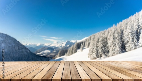 wooden terrace blurred and christmas background empty wood table top perspective in front beautiful winter landscape natural sky with light and mountain blur background image for product display