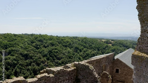 Aerial tracking shot of Saissac Castle in the south of France. Historic French castle. photo