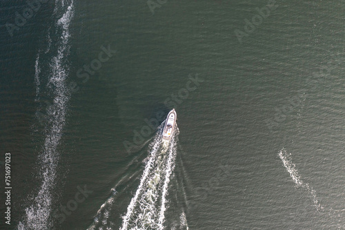 Yacht full speed from above