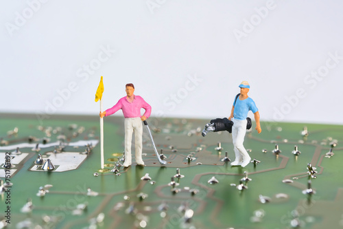 Golfer, athlete on an electronic component, photography of miniature figures