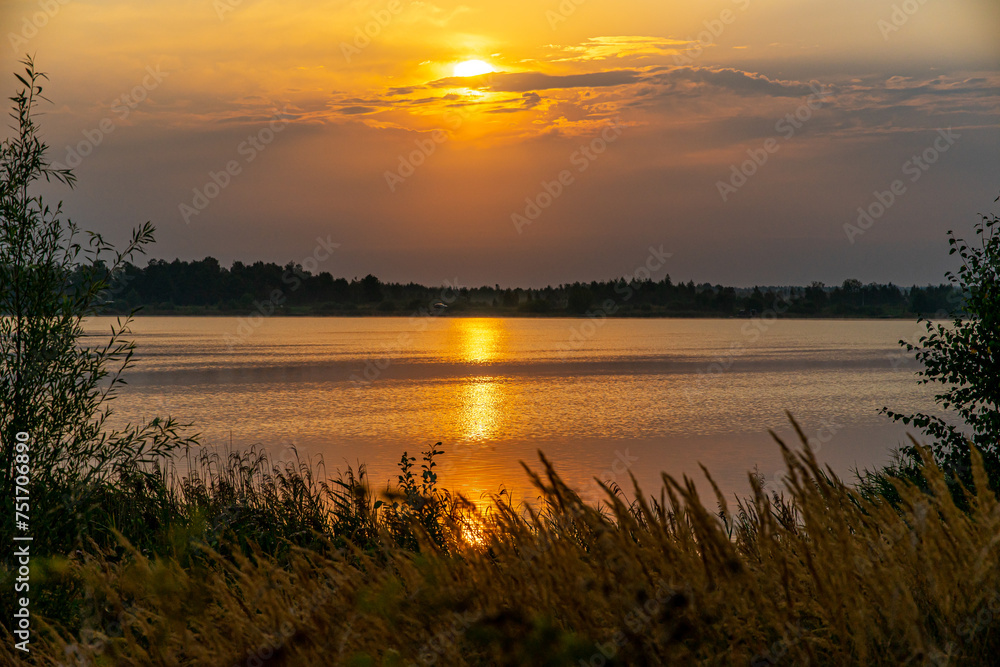 Fototapeta premium sunset over the river