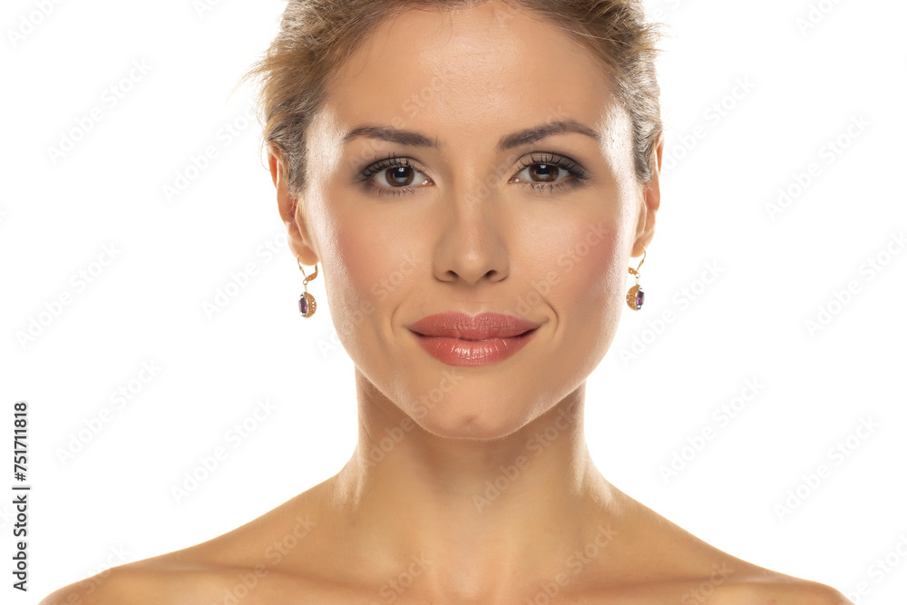 portrait of a smiling beautiful woman with makeup on a white background portrait of a smiling beautiful woman with makeup on a white background
