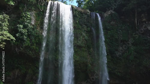 Shot of Misol Ha waterfall in the middle of the jungle in Chiapas, Mexico photo