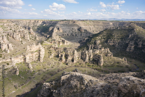 Ulubey Canyon is a nature park in the Ulubey and Karahallı of Usak, Turkey. The park provides suitable habitat for many species of animals and plants and is being developed as a centre for ecotourism.