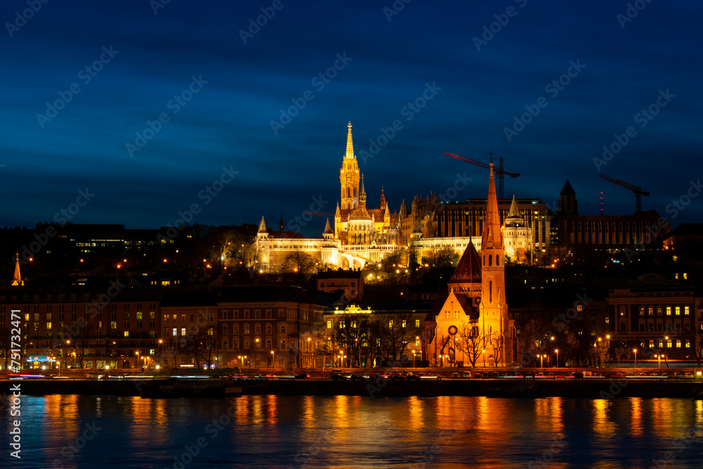 Matthias Church illuminated at night in Budapest, Hungary