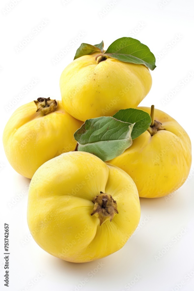 Ripe apple quince with green leaves isolated on white background.
