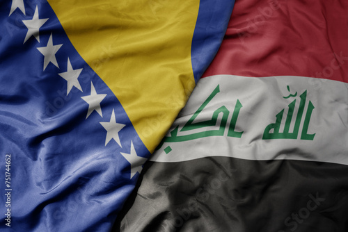 big waving national colorful flag of iraq and national flag of bosnia and herzegovina.