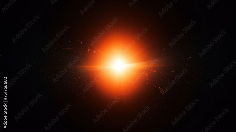 An amber light from the sun is shining in the dark sky. Sun with lens flare. High quality photo