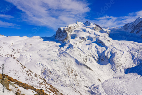 Panoramic view of the Gorner Glacier (Grenzgletscher) along with many summits of the Monte Rosa mountain range, as seen from the Gornergrat in the Swiss Alps, Valais, Switzerland photo