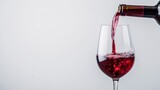 A Symphony of Crimson: Red Wine Cascading Into Glass