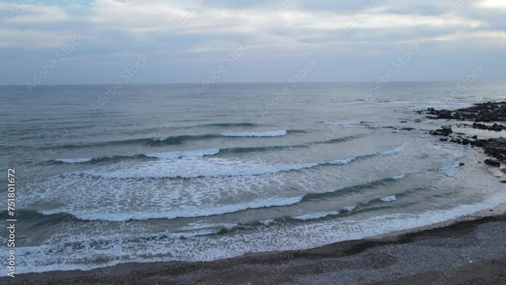 The scenic views of the sea and the waves at the beach of Side, Antalya The scenic views of the sea and the waves at the beach of Side, Antalya