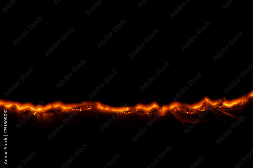 burning paper, glowing edge of paper burning paper, glowing edge of paper