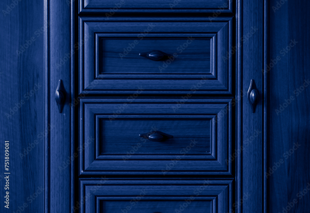 old style wooden chest of drawers background in blue old style wooden chest of drawers background in blue