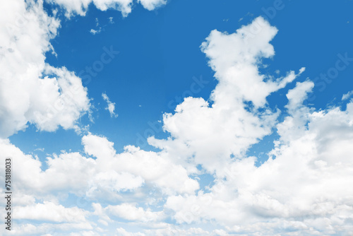 Heaven background. Cloudy sky background. Peaceful bright blue sky texture. Fluffy clouds on the sky background. Cloudscape view.