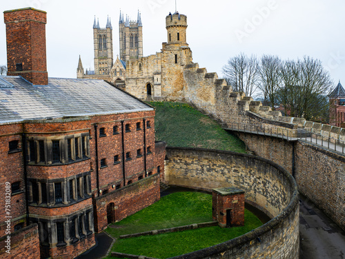 Tourists walking along the busy streets of the city of Lincoln and the castle. City Life Editorial The Hustle And Bustle Of City Life photo