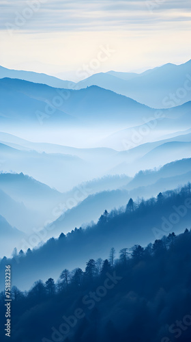 Blue Monochromatic Wonder: Spectacular Cascade of Foggy Mountains under Overcast sky